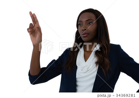 Businesswoman using interface screen Businesswoman using interface screen 34369281