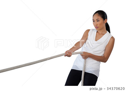 Young woman pulling rope 34370620