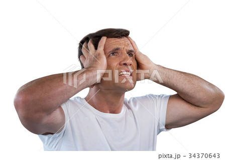 Mature man with head in hand looking away 34370643