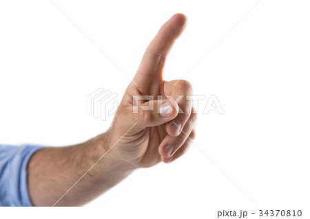 Male executive pressing an invisible virtual screen 34370810