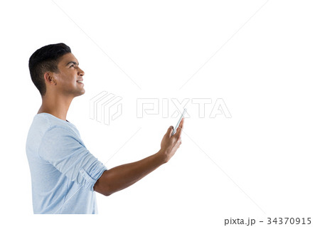 Man using digital tablet 34370915