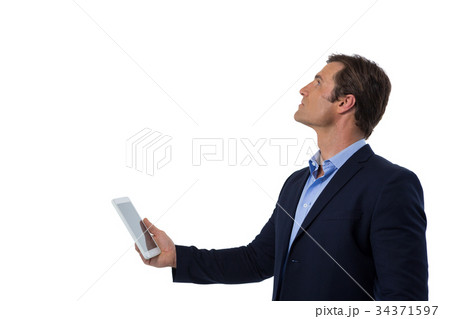 Businessman using digital tablet 34371597
