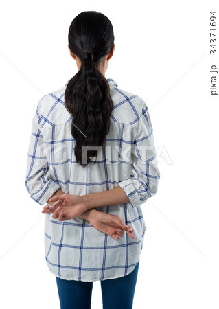 Woman gesturing against white background 34371694