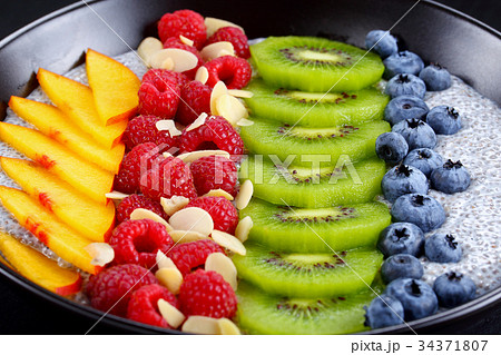 delicious chia seeds pudding in bowl delicious chia seeds pudding in bowl 34371807