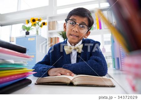 Portrait of businessman wearing eyeglasses Portrait of businessman wearing eyeglasses 34372029