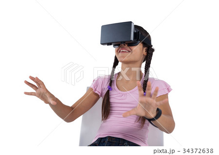 Girl using virtual reality headset 34372638