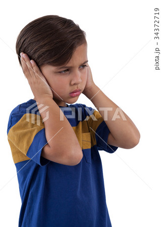 Cute boy covering his ears 34372719