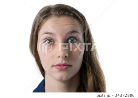 Confused teenage girl looking at camera 34372986