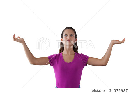 Girl standing with hands raised 34372987