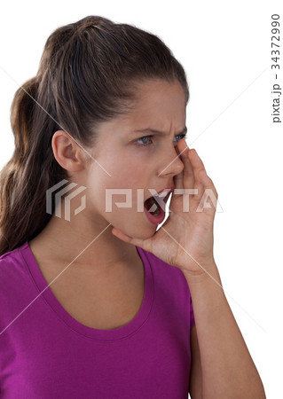 Angry girl screaming 34372990