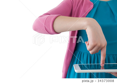Girl using digital tablet Girl using digital tablet 34373008