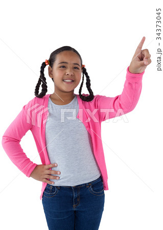 Girl pressing an invisible virtual screen 34373045