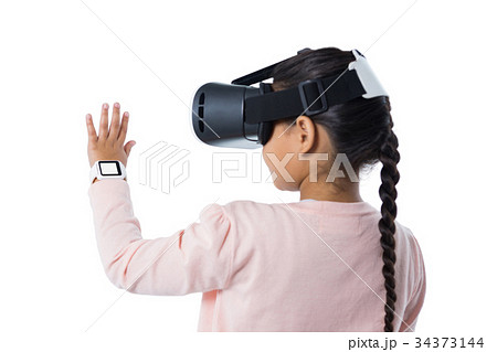 Girl using virtual reality headset 34373144
