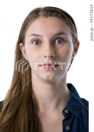 Confident teenage girl looking at camera 34373614