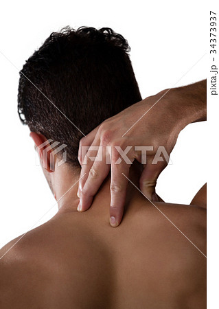 Rear view of shirtless player suffering from neck ache 34373937