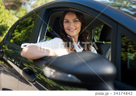 Beautiful woman driving a car Beautiful woman driving a car 34374842