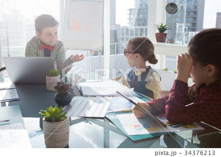 Children playing as business people Children playing as business people 34376213