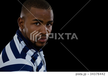 Close up portrait of confident rugby player 34376442