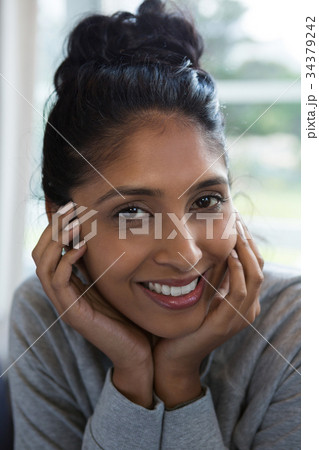 Close-up portrait of smiling woman Close-up portrait of smiling woman 34379242
