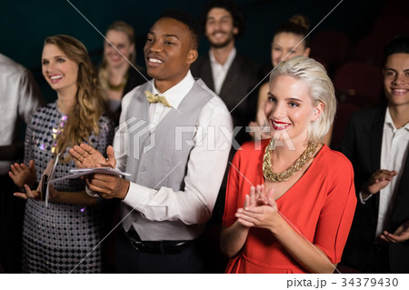 Group of people applauding 34379430