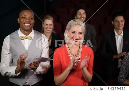 Group of people applauding Group of people applauding 34379452