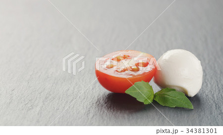 mozzarella balls with tomatoes and basil mozzarella balls with tomatoes and basil 34381301