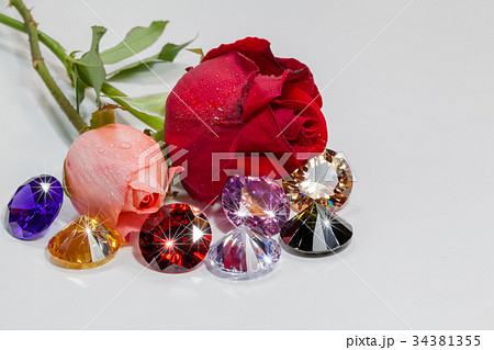 light pendant shine on the colorful gemstones. light pendant shine on the colorful gemstones. 34381355