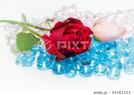 red rose flower on the colorful gemstones red rose flower on the colorful gemstones 34381553