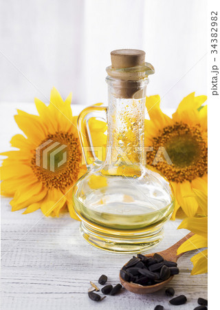 Sunflower oil, seeds and flower Sunflower oil, seeds and flower 34382982