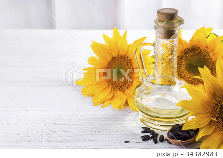Sunflower oil, seeds and flower Sunflower oil, seeds and flower 34382983