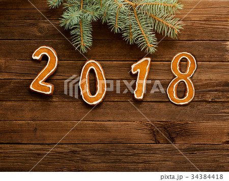 Figures 2018 on the wooden background Figures 2018 on the wooden background 34384418