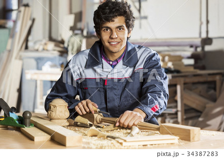 Carpenter at work 34387283