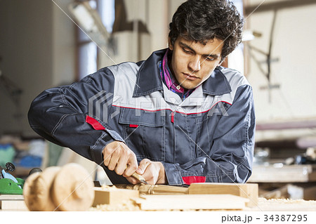 Carpenter at work 34387295