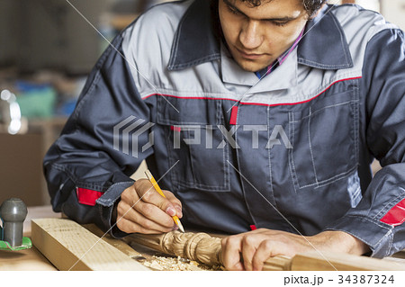 Carpenter at work 34387324