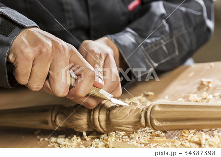 Carpenter at work 34387398