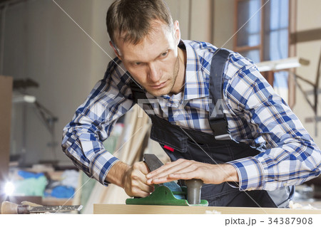 Carpenter at work 34387908