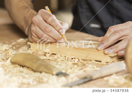 Carpenter at work 34387936