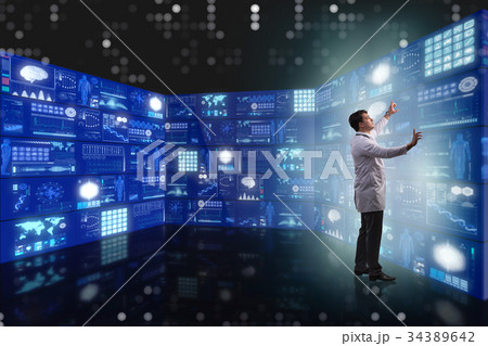 Doctor in telemedicine concept pressing buttons 34389642