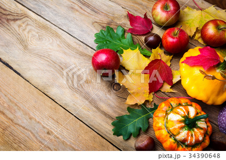 Apples, decorative pumpkin and yellow gourd  34390648