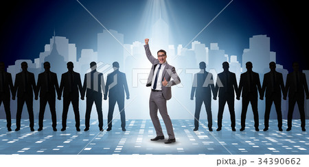 Businessman in the spotlight in business concept Businessman in the spotlight in business concept 34390662