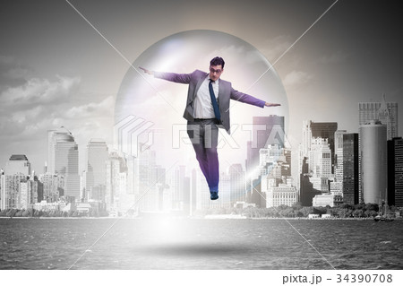 Businessman flying inside the bubble 34390708