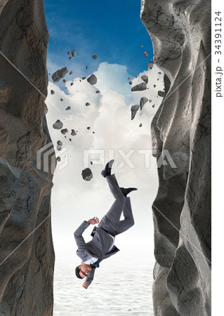 Businessman overcoming challenges in business Businessman overcoming challenges in business 34391124