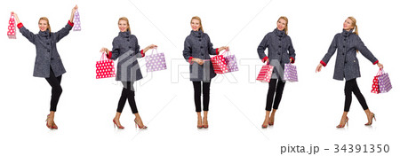 Woman with shopping bags isolated on white Woman with shopping bags isolated on white 34391350