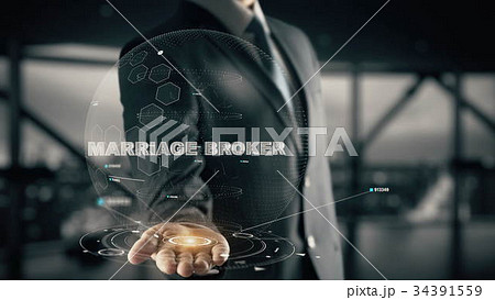 Marriage Broker with hologram businessman concept Marriage Broker with hologram businessman concept 34391559