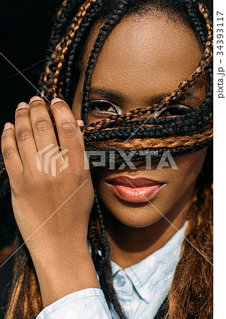 Shy African American female. Awkward mood 34393117