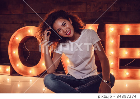 Curly haired girl with freckles in blank white t Curly haired girl with freckles in blank white t 34397274