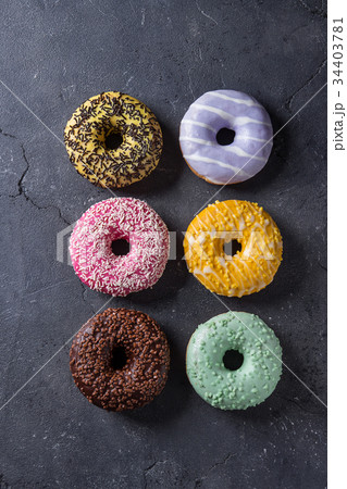Colorful glazed donuts Colorful glazed donuts 34403781