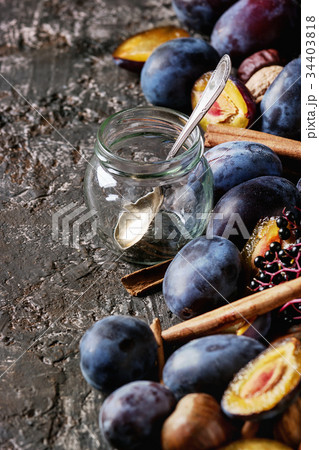 Plums and walnuts 34403818