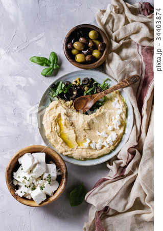 Hummus with olives and herbs 34403874