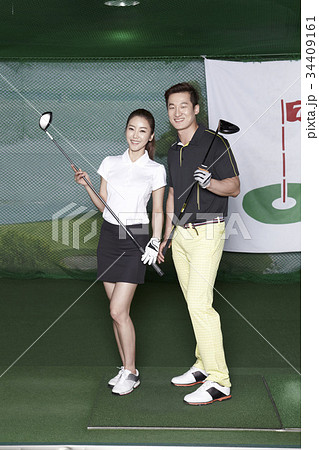 ゴルフ ゴルフ練習場 笑顔 34409161